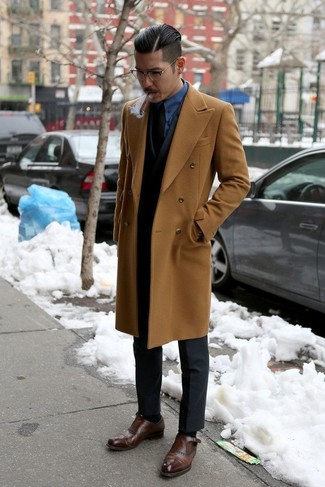 Camel Overcoat Dressy Outfits: Teaming a camel overcoat and a black suit will cement your sartorial chops. Let your sartorial expertise really shine by finishing off this outfit with dark brown leather double monks.