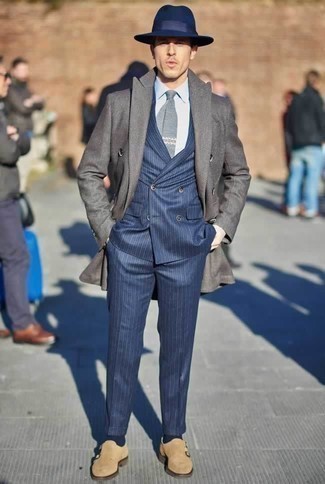 Navy Wool Hat Outfits For Men: To create an off-duty outfit with an urban spin, opt for a grey overcoat and a navy wool hat. Balance out this outfit with a more refined kind of footwear, like these beige suede double monks.