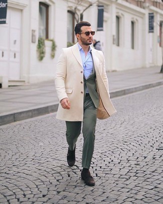 Light Blue Dress Shirt Cold Weather Outfits For Men: Try pairing a light blue dress shirt with a beige overcoat for a chic and elegant look. Complement this outfit with a pair of dark brown suede double monks and you're all set looking awesome.