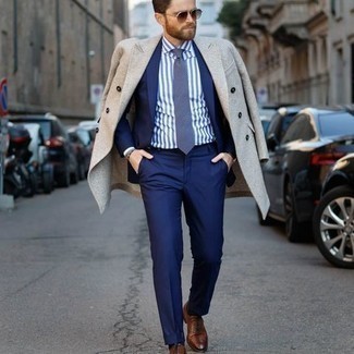 Camel Overcoat Dressy Outfits: You'll be surprised at how easy it is to get dressed this way. Just a camel overcoat and a blue suit. Look at how great this getup pairs with brown leather oxford shoes.