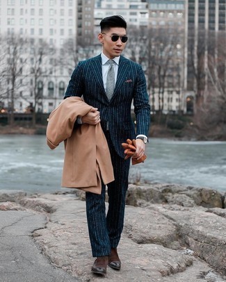 Camel Overcoat Dressy Outfits: Wear a camel overcoat and a navy vertical striped suit for sophisticated style with a modernized spin. A pair of dark brown suede chelsea boots easily steps up the style factor of this ensemble.