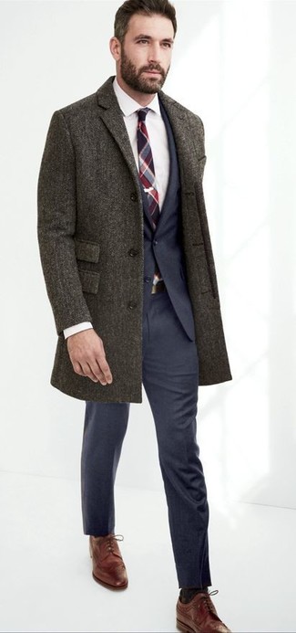 Grey Herringbone Overcoat Outfits: This combo of a grey herringbone overcoat and a navy suit is a tested option when you need to look seriously smart. And if you wish to effortlessly play down this look with a pair of shoes, complete this outfit with brown leather brogues.