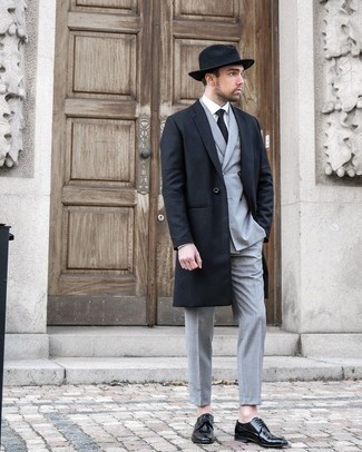 Black Wool Hat Outfits For Men: A black overcoat and a black wool hat are a bold casual pairing that every sartorial-savvy gent should have in his casual wardrobe. Add a pair of black leather derby shoes to the mix to make the look a bit sleeker.