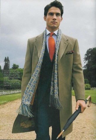 Light Blue Scarf Outfits For Men: Wear an olive overcoat with a light blue scarf to get a bold casual and stylish outfit.