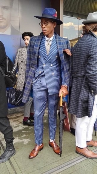 Navy and White Vertical Striped Suit Outfits: You'll be amazed at how extremely easy it is to throw together this classy look. Just a navy and white vertical striped suit and a navy plaid overcoat. Complement your outfit with brown leather oxford shoes for an extra touch of refinement.