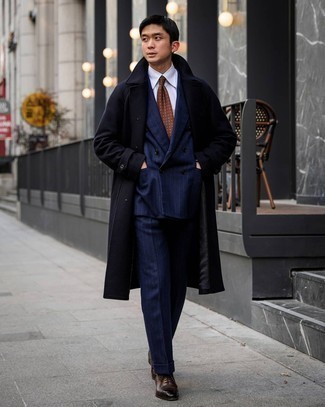 500+ Dressy Fall Outfits For Men: A black overcoat and a navy vertical striped suit are a sophisticated getup that every modern guy should have in his wardrobe. The whole ensemble comes together perfectly when you complete your look with a pair of dark brown leather oxford shoes. It's is an exciting choice if you're figuring out a kick-ass look that will take you from summer to fall.