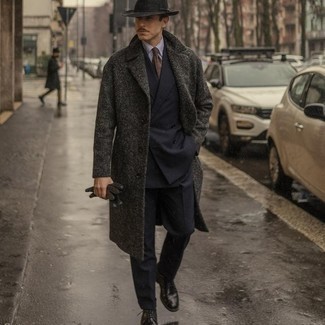 Charcoal Overcoat Dressy Outfits: This refined pairing of a charcoal overcoat and a black suit is a common choice among the fashion-forward chaps. On the shoe front, go for something on the laid-back end of the spectrum and finish off this look with black leather derby shoes.