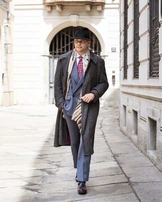 Navy Suit Outfits: A navy suit and a charcoal overcoat are absolute mainstays if you're figuring out a polished wardrobe that matches up to the highest sartorial standards. Want to tone it down on the shoe front? Introduce a pair of dark brown leather loafers to the mix for the day.