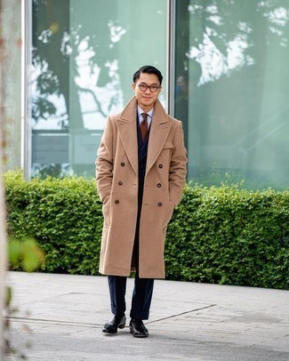1200+ Chill Weather Outfits For Men: A camel overcoat and a navy vertical striped suit are worth being on your list of true menswear essentials. If you're clueless about how to finish, a pair of black leather oxford shoes is a nice choice.