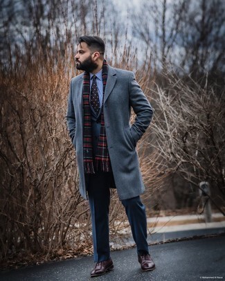 Multi colored Plaid Scarf Outfits For Men: A grey overcoat and a multi colored plaid scarf are among the fundamental pieces in any modern man's great off-duty sartorial collection. Stick to a more elegant route when it comes to shoes by finishing with dark brown leather oxford shoes.