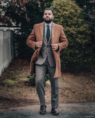 Charcoal Plaid Wool Suit Outfits: Rock a charcoal plaid wool suit with a tobacco overcoat for manly refinement with a twist. Rounding off with dark brown leather chelsea boots is a guaranteed way to add a bit more edginess to your outfit.