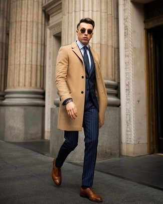 500+ Dressy Chill Weather Outfits For Men: Combining a camel overcoat and a navy vertical striped suit is a surefire way to infuse style into your styling lineup. Add a pair of brown leather oxford shoes to this ensemble et voila, the outfit is complete.