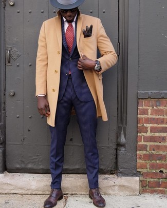 Men's Camel Overcoat, Navy Vertical Striped Suit, Dark Brown Leather Oxford Shoes, Charcoal Wool Hat