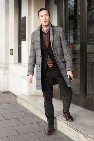 Brown Sweater Vest Outfits For Men: Putting together a brown sweater vest and a grey plaid overcoat is a fail-safe way to infuse personality into your wardrobe. For something more on the daring side to complete this getup, complete your outfit with a pair of burgundy leather casual boots.
