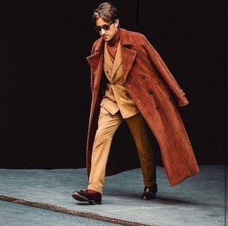 Dark Brown Turtleneck Outfits For Men: Marry a dark brown turtleneck with a tobacco overcoat for a classic combination. Finishing off with burgundy leather tassel loafers is a guaranteed way to bring a touch of class to this look.