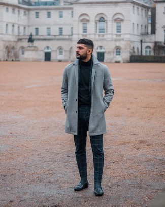 Navy Turtleneck Outfits For Men: This combination of a navy turtleneck and a grey overcoat is a must-try casually neat ensemble for any modern gentleman. To bring out a polished side of you, finish off with a pair of black leather loafers.