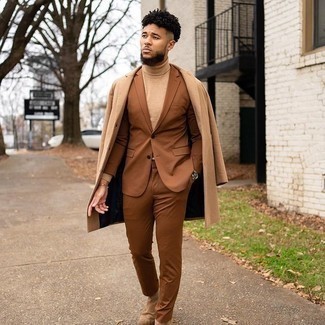 Brown Suit Outfits: This combination of a brown suit and a camel overcoat will add alpha male essence to your look. Why not add tan suede chelsea boots to the mix for a more casual twist?