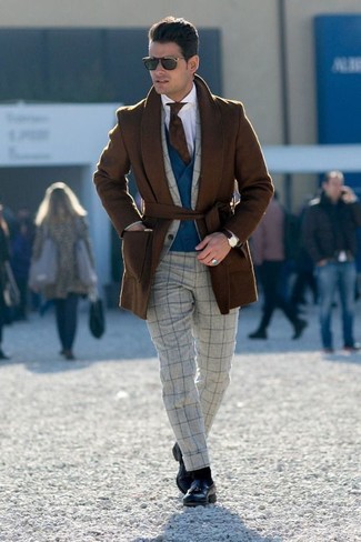 Charcoal Check Wool Suit Outfits: Combining a charcoal check wool suit with a brown overcoat is an on-point option for a smart and polished look. We're totally digging how a pair of black leather tassel loafers makes this outfit whole.