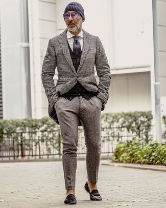 Grey Wool Chinos Outfits: Putting together a grey plaid overcoat with grey wool chinos is an amazing pick for a casually smart look. Black velvet loafers add a classy aesthetic to the look.
