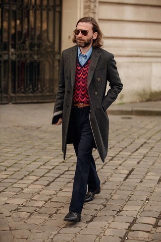 Red Print Sweater Vest Outfits For Men: This getup clearly illustrates that it is totally worth investing in such timeless menswear pieces as a red print sweater vest and navy dress pants. Let your outfit coordination savvy really shine by completing your look with a pair of dark brown leather chelsea boots.