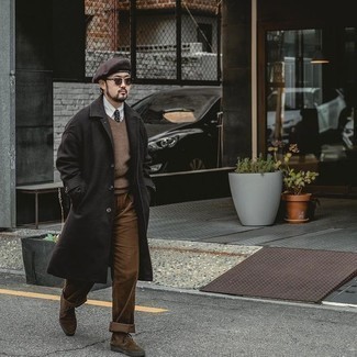 Black Overcoat Outfits: Combining a black overcoat and brown chinos is a fail-safe way to infuse your wardrobe with some masculine elegance. Add a pair of dark brown suede desert boots to the mix to effortlessly dial up the appeal of this outfit.