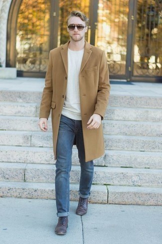 White Sweatshirt Outfits For Men: A white sweatshirt and navy jeans are the kind of a fail-safe off-duty combo that you need when you have no time to dress up. Up the style ante of your outfit by slipping into dark brown leather casual boots.