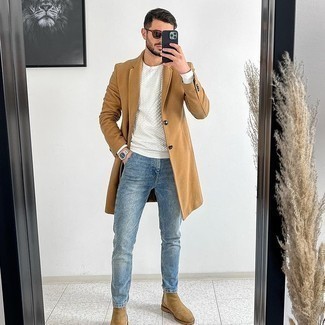 Tan Suede Chelsea Boots Outfits For Men: Ramp up your sprezzatura game by wearing a camel overcoat and blue jeans. Finishing with tan suede chelsea boots is a guaranteed way to introduce a little flair to this outfit.