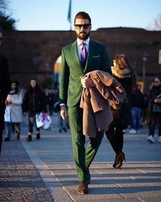 Green Three Piece Suit Outfits: Pair a green three piece suit with a brown overcoat to have all eyes on you. Complete this outfit with brown leather chelsea boots to instantly bump up the appeal of your ensemble.