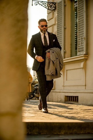 Dark Green Suit Outfits: Without any doubt, you'll look modern and smart in a dark green suit and a white and black houndstooth overcoat. A pair of brown leather loafers will be the ideal complement to your ensemble.