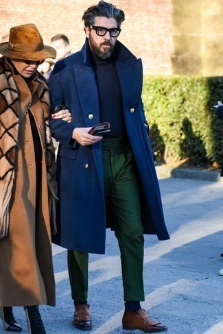 Navy Overcoat Outfits: Make a navy overcoat and dark green chinos your outfit choice to put together an effortlessly classic and modern-looking ensemble. Avoid looking too casual by rounding off with brown leather double monks.