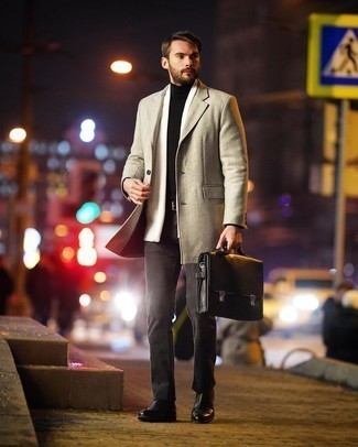White Scarf Outfits For Men: If you prefer urban combos, why not dress in a beige overcoat and a white scarf? Complement your outfit with a pair of black leather chelsea boots to avoid looking too casual.