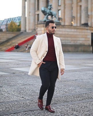 Burgundy Leather Double Monks Outfits: We're loving how this smart combo of a white overcoat and black chinos instantly makes any man look dapper. Complete this look with burgundy leather double monks to make the outfit a bit smarter.