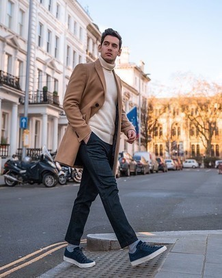 Camel Overcoat Outfits: This smart combo of a camel overcoat and navy chinos is capable of taking on different forms according to the way it's styled. Complete this outfit with navy suede low top sneakers to make a sober look feel suddenly fun and fresh.