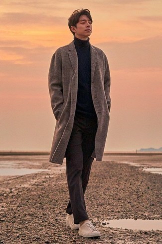 Dark Brown Overcoat Outfits: This pairing of a dark brown overcoat and dark brown chinos is perfect when you need to look casually refined in a flash. A good pair of beige canvas low top sneakers is the simplest way to transform your ensemble.