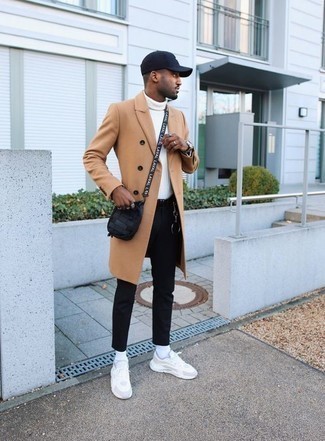 Camel Overcoat Warm Weather Outfits: Combining a camel overcoat and black chinos is a surefire way to infuse your current wardrobe with some casual elegance. A pair of white athletic shoes adds a new dimension to your look.