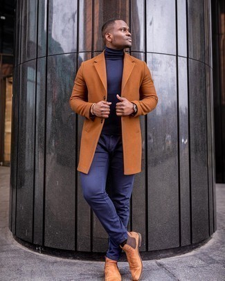 Dark Brown Suede Chelsea Boots Outfits For Men: Up your sartorial game by opting for a tobacco overcoat and navy chinos. Want to dress it up with footwear? Round off with dark brown suede chelsea boots.
