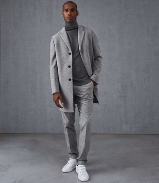Grey Overcoat with Turtleneck Cold Weather Outfits In Their 20s: Such pieces as a grey overcoat and a turtleneck are the perfect way to inject a dose of masculine sophistication into your day-to-day collection. Rev up this whole ensemble by sporting white canvas low top sneakers. If you're worried about dressing to look more mature, this combination is a winning option.