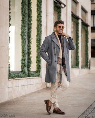 Grey Overcoat Outfits: For an ensemble that's smart casual and camera-worthy, marry a grey overcoat with beige chinos. For a more polished vibe, complement this look with a pair of dark brown leather tassel loafers.