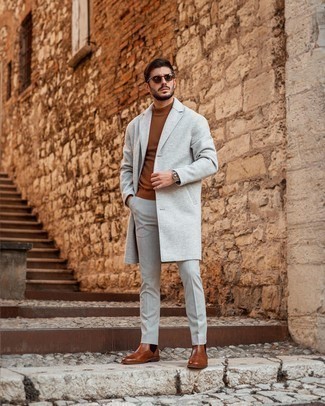 Silver Watch Cold Weather Outfits For Men: Why not consider wearing a grey overcoat and a silver watch? Both of these pieces are very functional and will look nice paired together. Serve a little mix-and-match magic by sporting a pair of brown leather chelsea boots.