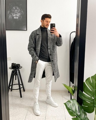 White Leather Low Top Sneakers Outfits For Men: Putting together a charcoal overcoat and white chinos is a guaranteed way to inject your wardrobe with some manly elegance. Avoid looking too polished by finishing with white leather low top sneakers.