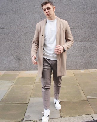 White Leather Low Top Sneakers Cold Weather Outfits For Men: Channel your inner maverick in the menswear department and wear a beige overcoat with brown check chinos. Add an easy-going vibe to with white leather low top sneakers.