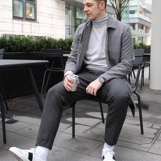 White and Black Houndstooth Overcoat Outfits: This combination of a white and black houndstooth overcoat and charcoal chinos is a winning option when you need to look dapper but have zero time to spare. White and black leather low top sneakers will create a stylish contrast against the rest of the look.