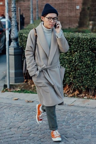 Orange Low Top Sneakers Outfits For Men: Make a grey overcoat and grey wool dress pants your outfit choice to look like a real gent. And if you want to immediately play down this getup with a pair of shoes, why not complete this outfit with orange low top sneakers?