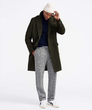 Charcoal Wool Dress Pants Smart Casual Outfits For Men: An olive overcoat and charcoal wool dress pants are a seriously stylish ensemble to try. Finishing with a pair of white low top sneakers is a surefire way to inject a more laid-back aesthetic into your outfit.