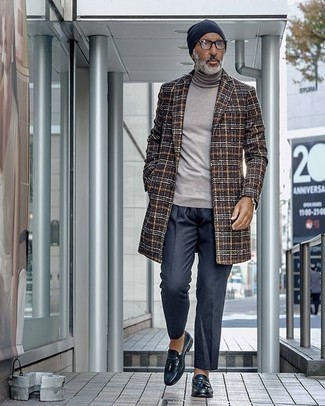 Navy Beanie Outfits For Men: This bold casual combination of a dark brown plaid overcoat and a navy beanie is extremely easy to pull together without a second thought, helping you look awesome and prepared for anything without spending too much time digging through your wardrobe. For a dressier take, why not complement your getup with a pair of navy leather tassel loafers?