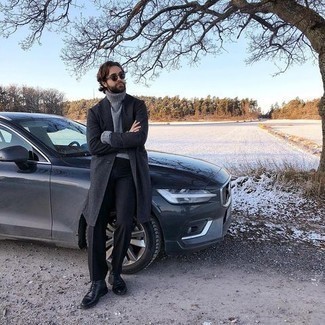 Grey Wool Turtleneck Outfits For Men: You're looking at the irrefutable proof that a grey wool turtleneck and black dress pants look awesome when you pair them together in an elegant look for today's gentleman. A pair of black leather casual boots will add a fun feel to this look.