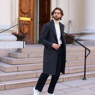 Navy Overcoat Warm Weather Outfits: Dress in a navy overcoat and navy dress pants if you're aiming for a proper, stylish outfit. For something more on the daring side to finish this ensemble, grab a pair of white canvas low top sneakers.