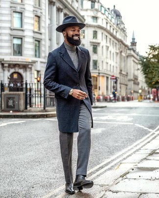 Navy Wool Hat Outfits For Men: This relaxed casual pairing of a navy plaid overcoat and a navy wool hat is a life saver when you need to look great in a flash. Bring a hint of class to your ensemble with black leather chelsea boots.