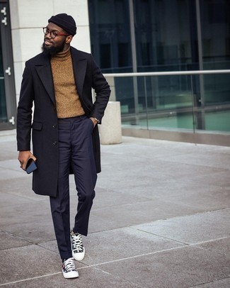 Beige Turtleneck Outfits For Men: A beige turtleneck and navy dress pants are worth being on your list of wardrobe staples. Go ahead and introduce black polka dot canvas low top sneakers to the equation for a dose of stylish nonchalance.