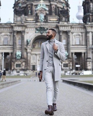 Grey Dress Pants with Turtleneck Cold Weather Outfits For Men: Combining a turtleneck and grey dress pants is a guaranteed way to inject your wardrobe with some manly sophistication. Add a pair of dark brown leather chelsea boots to this outfit et voila, the look is complete.